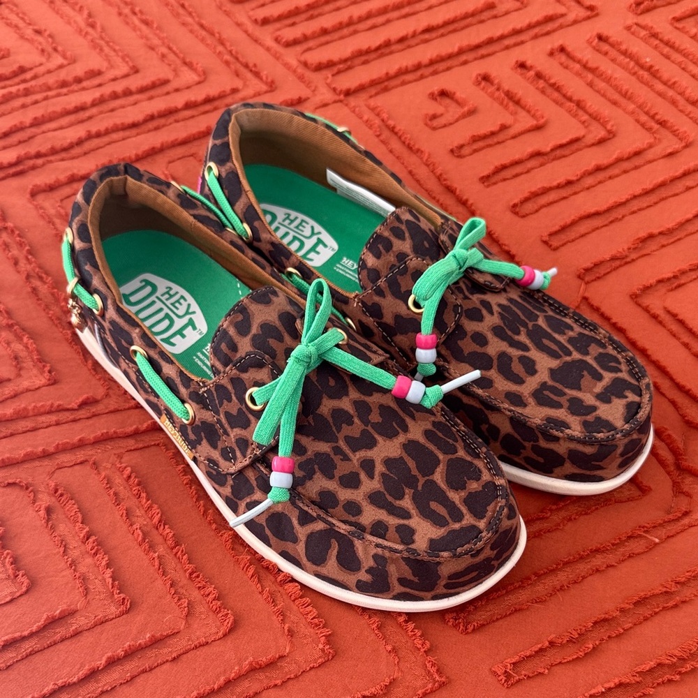 Like new condition Hey Dude leopard print shoes. Size 7.